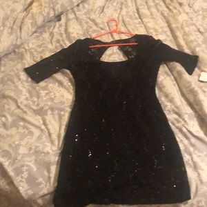 Women’s short black dress with sequins